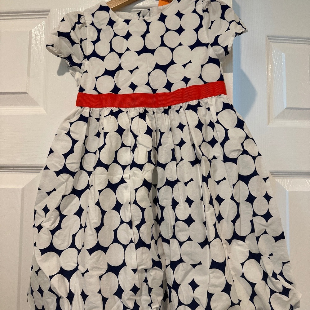 Blue and and white dress with red/orange bow